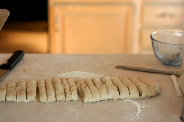 Yeast dough cut into strips.