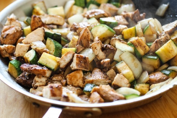 A skillet of hibachi chicken and shrimp.