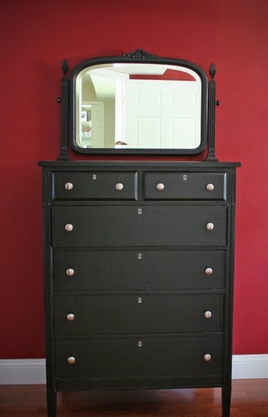 tallboy dresser painted black.