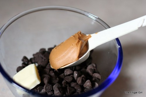 a bowl of chocolate frosting ingredients