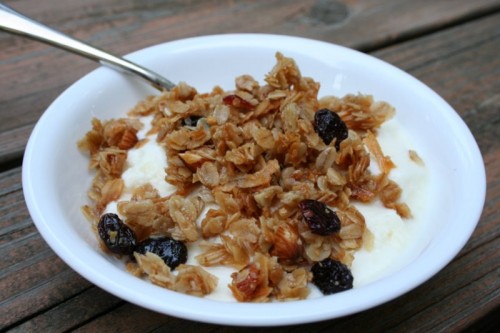 A bowl of yogurt topped with granola