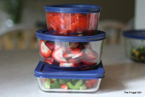 Three pyrex containers stacked on top of each other.