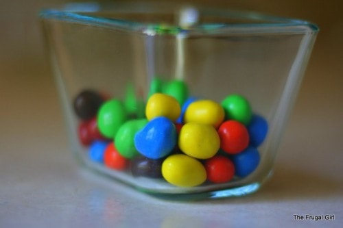 Candy in a glass container.