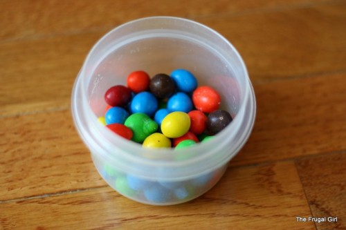 Candy in a plastic container.