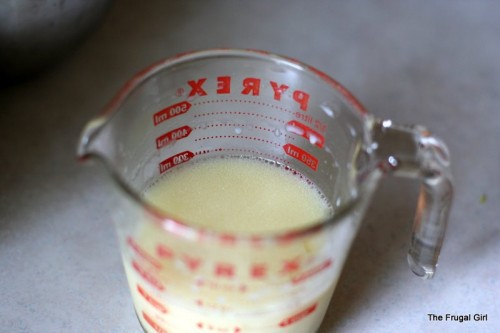 Wet ingredients in a Pyrex measuring cup.