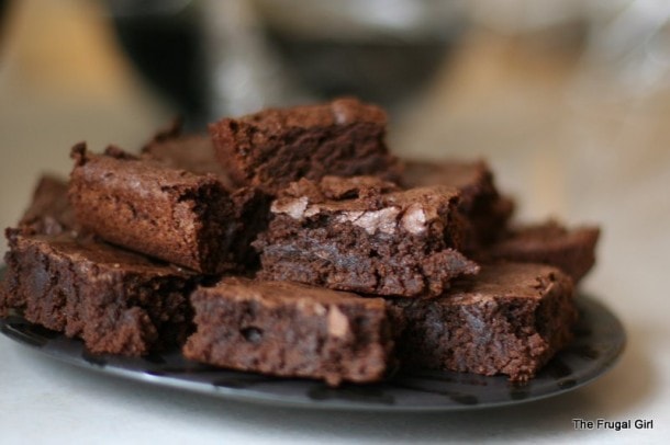 homemade brownies on a plate.