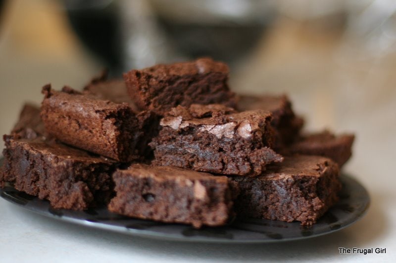 homemade brownies on a plate.