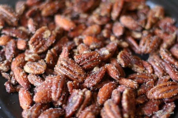 Spiced pecans in a skillet.