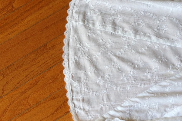 A white lace-edged skirt.