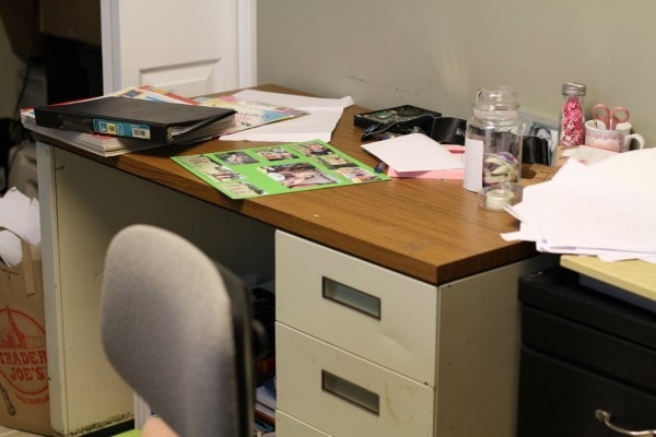 A messy metal desk.