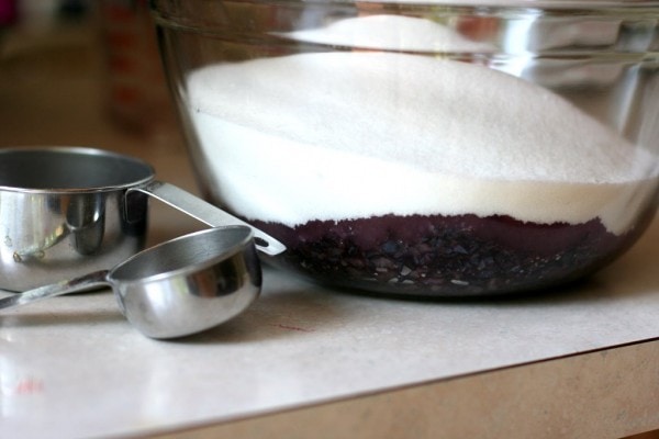 Jam ingredients in a glass bowl.