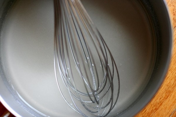 A metal whisk.