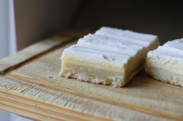 An almond bar on a cutting board.