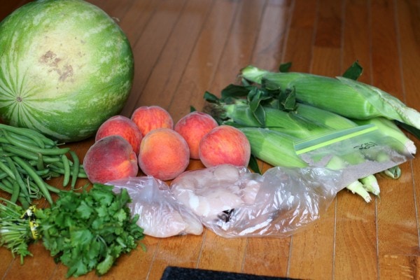 Local produce on an oak surface.