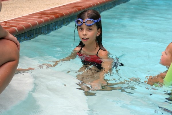 Lisey swimming with goggles.