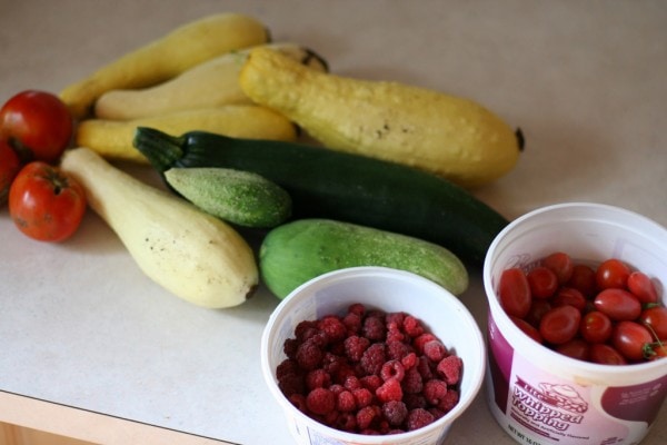 Summer produce on a countertop.