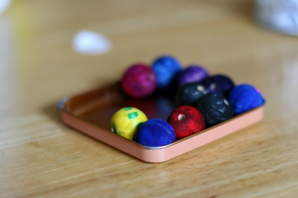 Wooden beads, colored with markers.