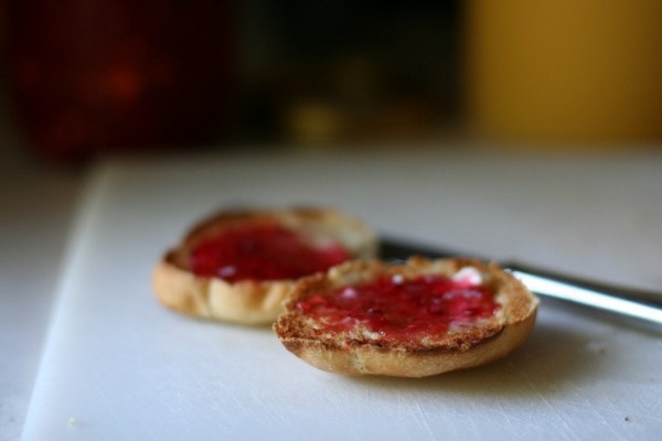 Raspberry jam on a toasted roll.