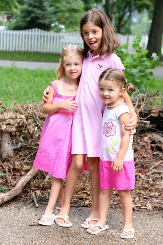 Sonia, Lisey, and Zoe all in pink dresses