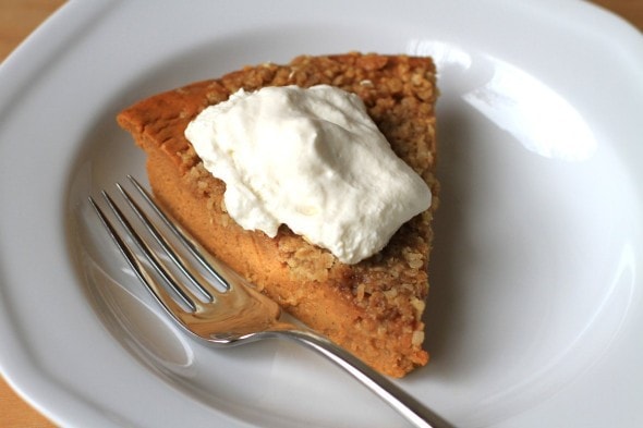 pumpkin pie with whipped cream topping