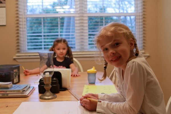 two girls at the table.