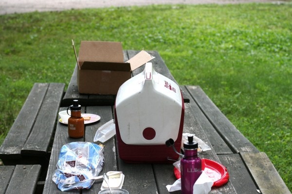 A picnic lunch on a wooden table.