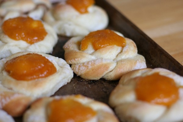 A pan of apricot sweet rolls.