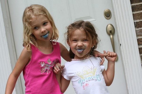 Zoe and Sonia with blue tongues.