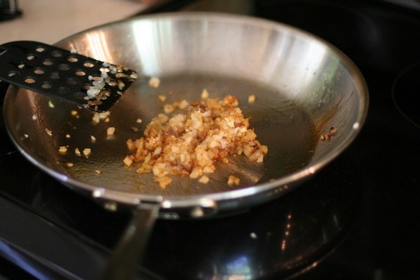 Browned onions in a skillet.
