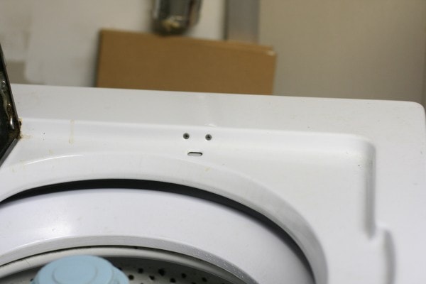 A face in the side of a washer.