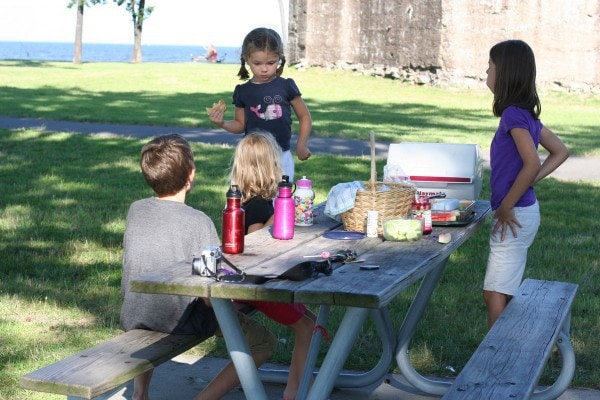 Children at a picnic table.