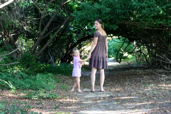 Kristen and Zoe, holding hands.