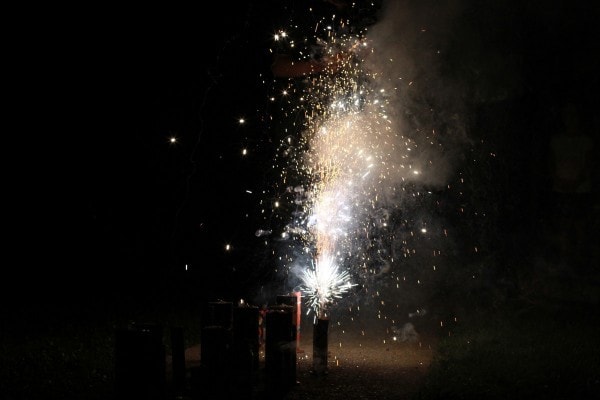 Ground-based firecrackers and smoke.