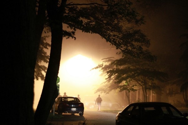 A smoky street after fireworks.