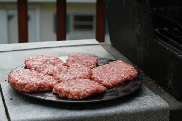 Uncooked hamburger patties.