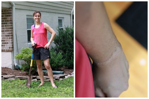 Kristen in work clothes, holding a shovel.