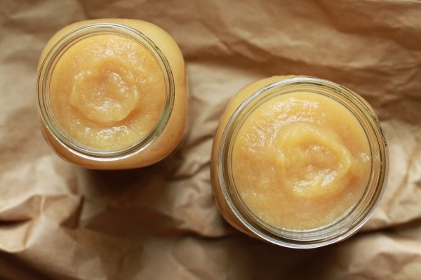 homemade applesauce in glass Mason jars.