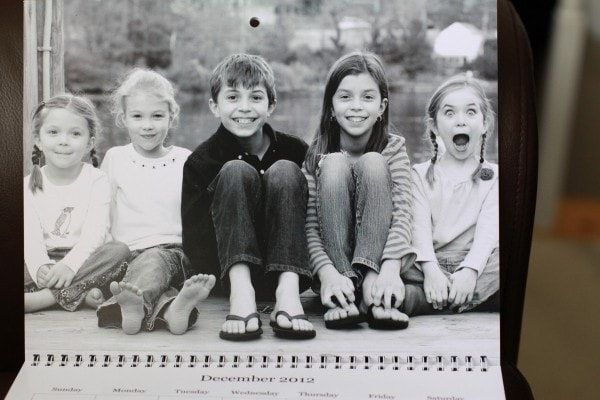 Five children on a dock.