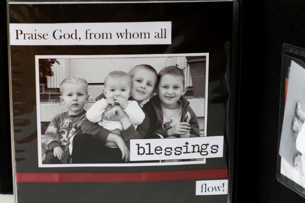 A scrapbook page with a photo of four children.