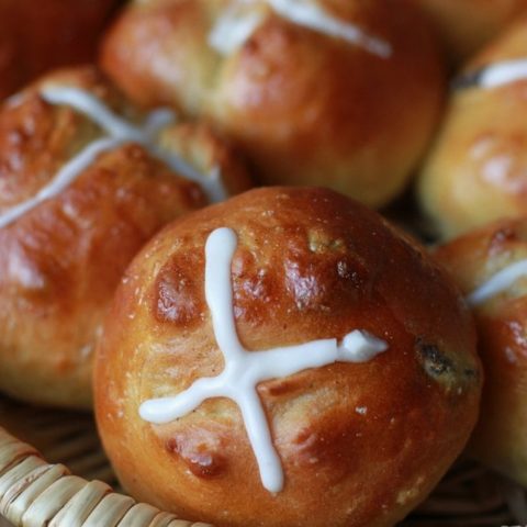 hot cross buns in a basket.