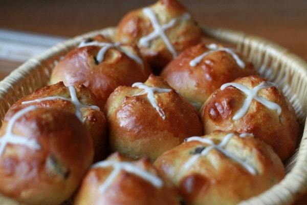 A basket of hot cross buns.