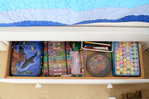 A drawer full of craft supplies.