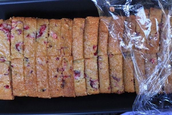 Sliced cranberry bread on a platter.