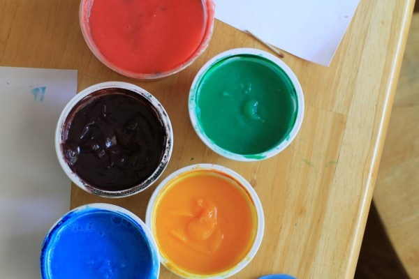 Five containers of finger paint.