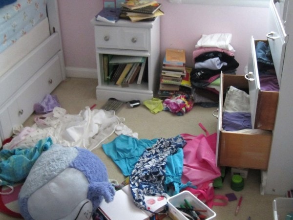 A messy child's bedroom.