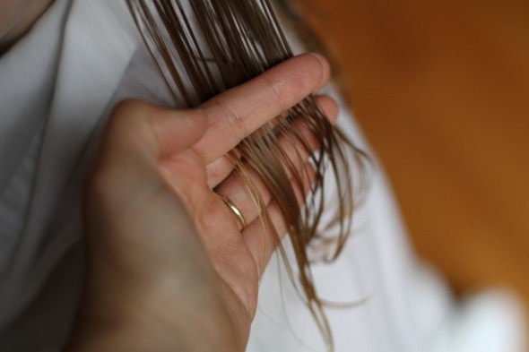 using fingers as a guide for home haircut