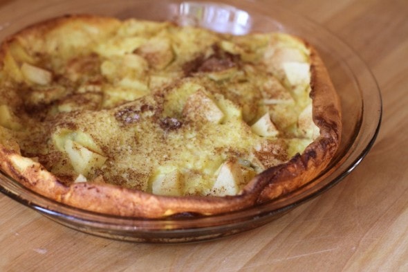Apple pancake in a pie plate.