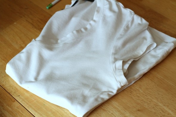 A folded white t-shirt.