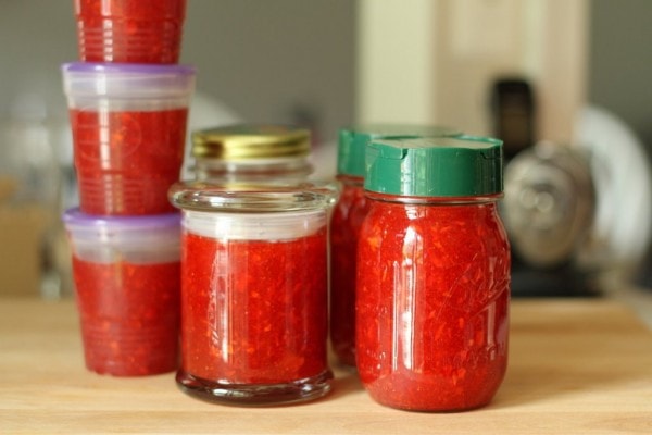 Containers of homemade strawberry jam.