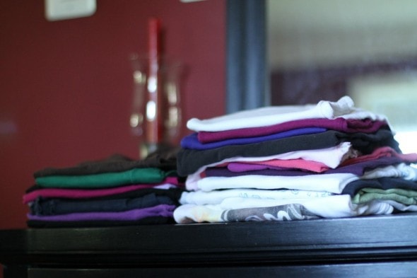 Piles of folded clothes.